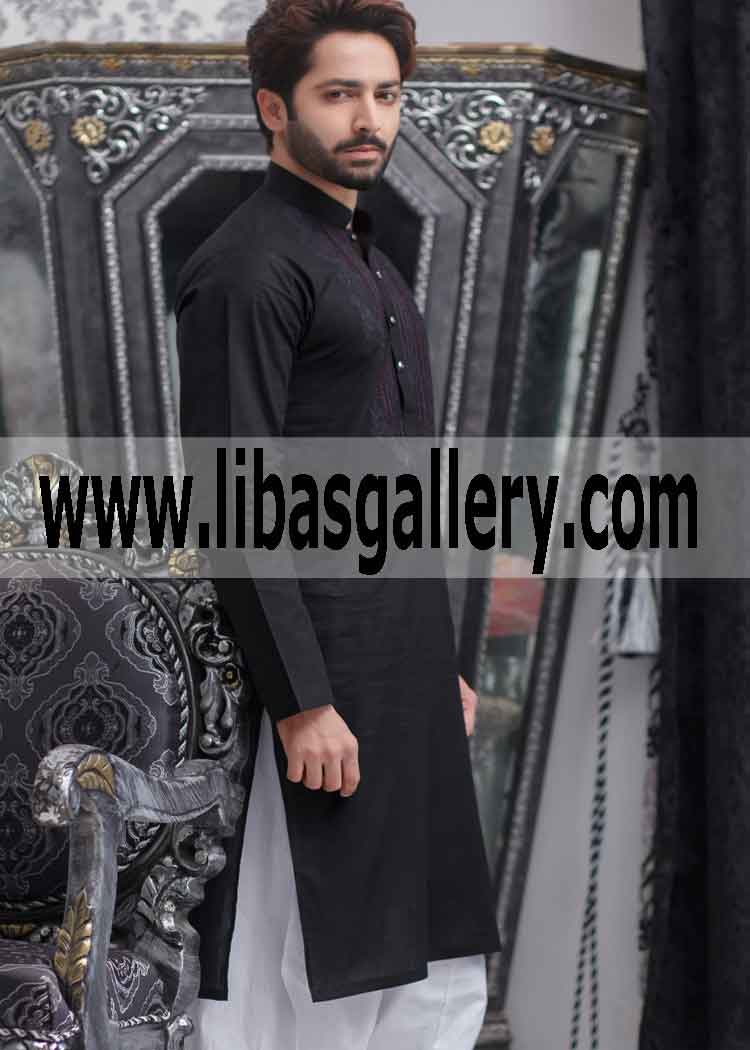 Young man in black and white kurta shalwar