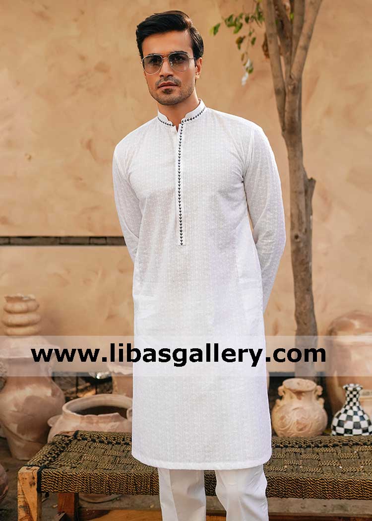 White Chikankari kurta with black embroidery detail neck