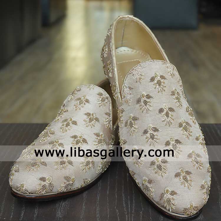 light beige hand made loafers crafted from soft fabric for groom with detailed gold embroidery tradtional look