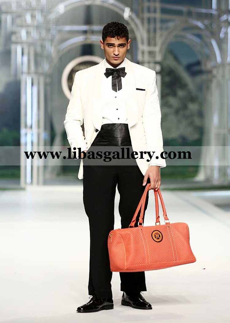 White Self Velvet Tux detailed 1 Button Round Lapel paired with Super Black Pants and White Pintex Shirt Satin Belt Bow qatar kuwait oman White Self Velvet Tux detailed 1 Button Round Lapel paired with Super Black Pants and White Pintex Shirt Satin Belt Bow qatar kuwait oman