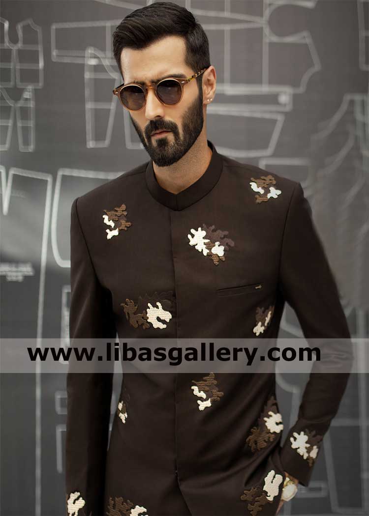 Loyal macho man standing in designer wedding prince coat suit