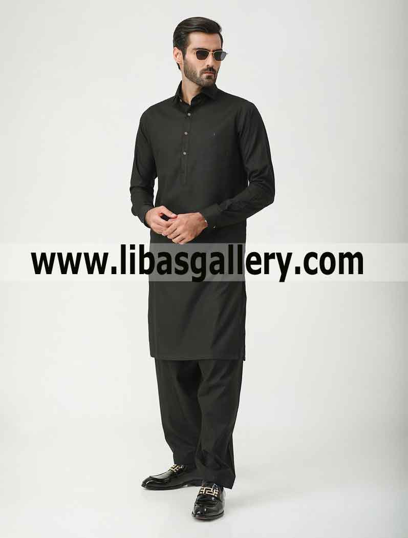 black kameez shalwar man first choice to look smart and unique among party people Dallas Texas USA black kameez shalwar man first choice to look smart and unique among party people Dallas Texas USA