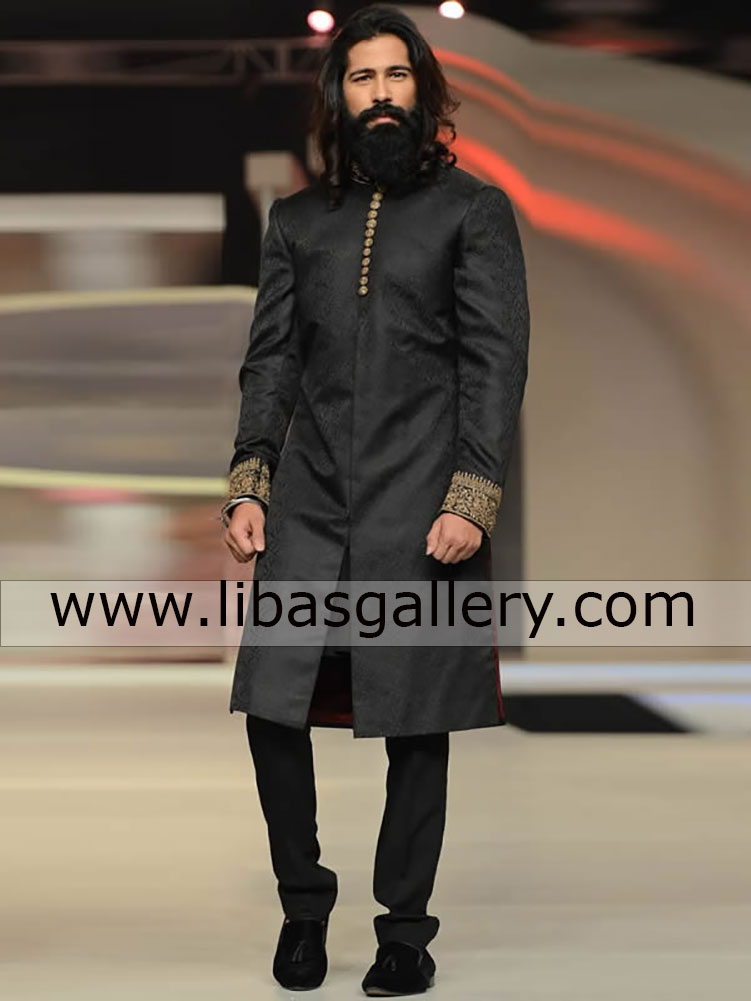 gentleman on ramp in black jamawar groom wedding sherwani suit
