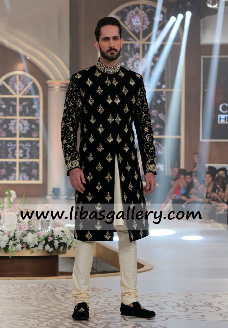 Grandiose black velvet embellished wedding sherwani for groom barat collar front sleeves hand work Qatar Kuwait Switzerland Grandiose black velvet embellished wedding sherwani for groom barat collar front sleeves hand work Qatar Kuwait Switzerland