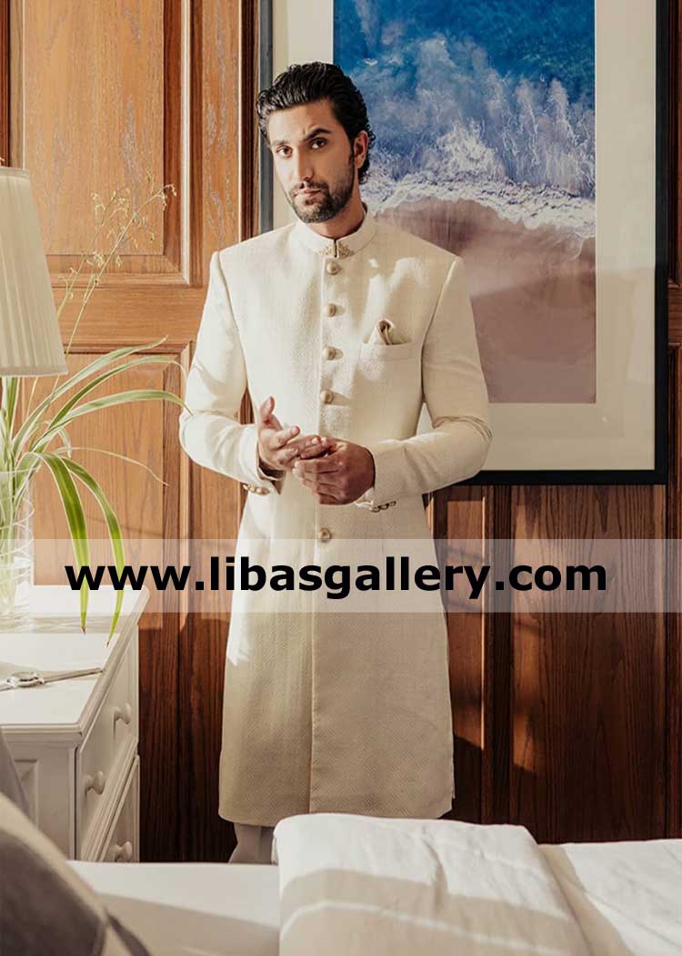 Delicate handcrafted collar corner motif ivory groom wedding sherwani design in karandi fabric ahad raz mir serious mood dubai uk usa canada Delicate handcrafted collar corner motif ivory groom wedding sherwani design in karandi fabric ahad raz mir serious mood dubai uk usa canada