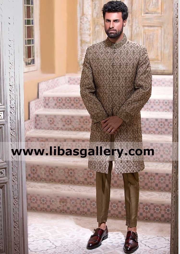 Pious Groom wearing mens embroidered wedding jacket 