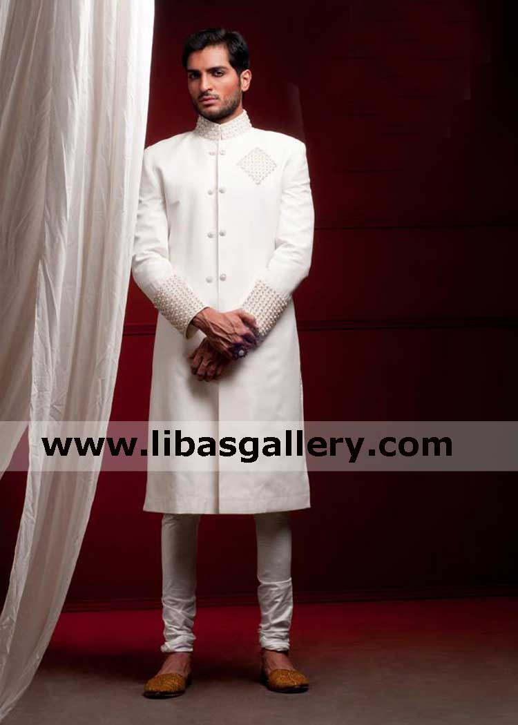 Jaw drop latest white groom wedding sherwani design omar shahad showing nicely nikah barat sherwani hand embellished shop online qatar saudi arabia kuwait Jaw drop latest white groom wedding sherwani design omar shahad showing nicely nikah barat sherwani hand embellished shop online qatar saudi arabia kuwait