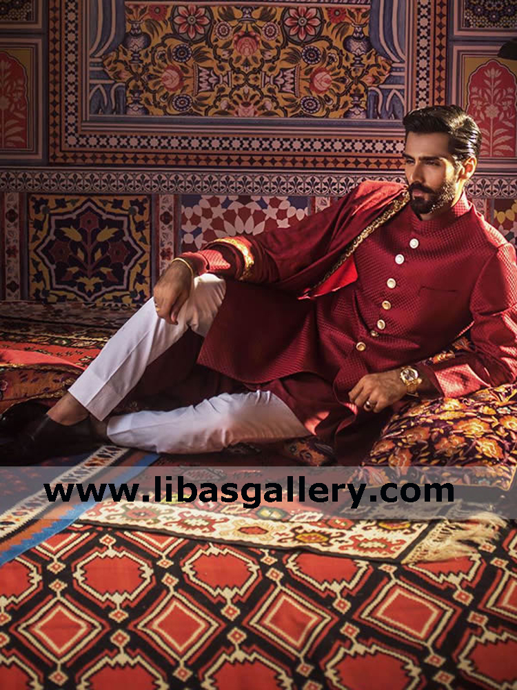 hasnain lehri sitting on carpet like prince of persia in carmine mens sherwani suit for inter city wedding event Maryland Baltimore usa hasnain lehri sitting on carpet like prince of persia in carmine mens sherwani suit for inter city wedding event Maryland Baltimore usa