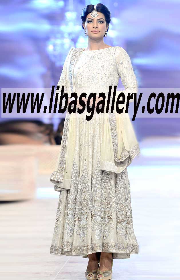 Irresistible Beige color Anarkali Dress with exquisite and lovely embellishments for Wedding and Special Occasions