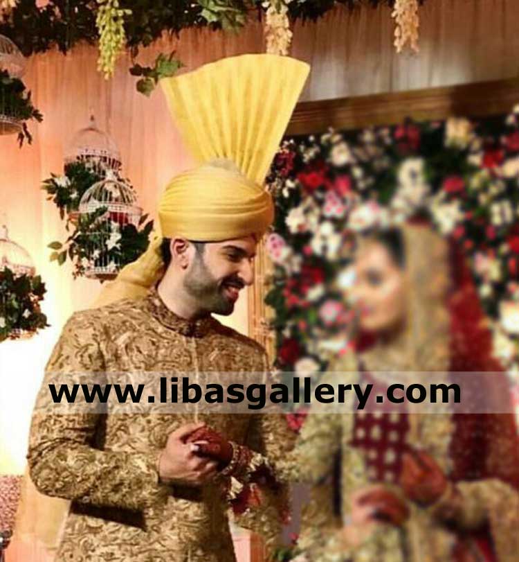 Happy groom on nikah in tower turban amber with pretty bride
