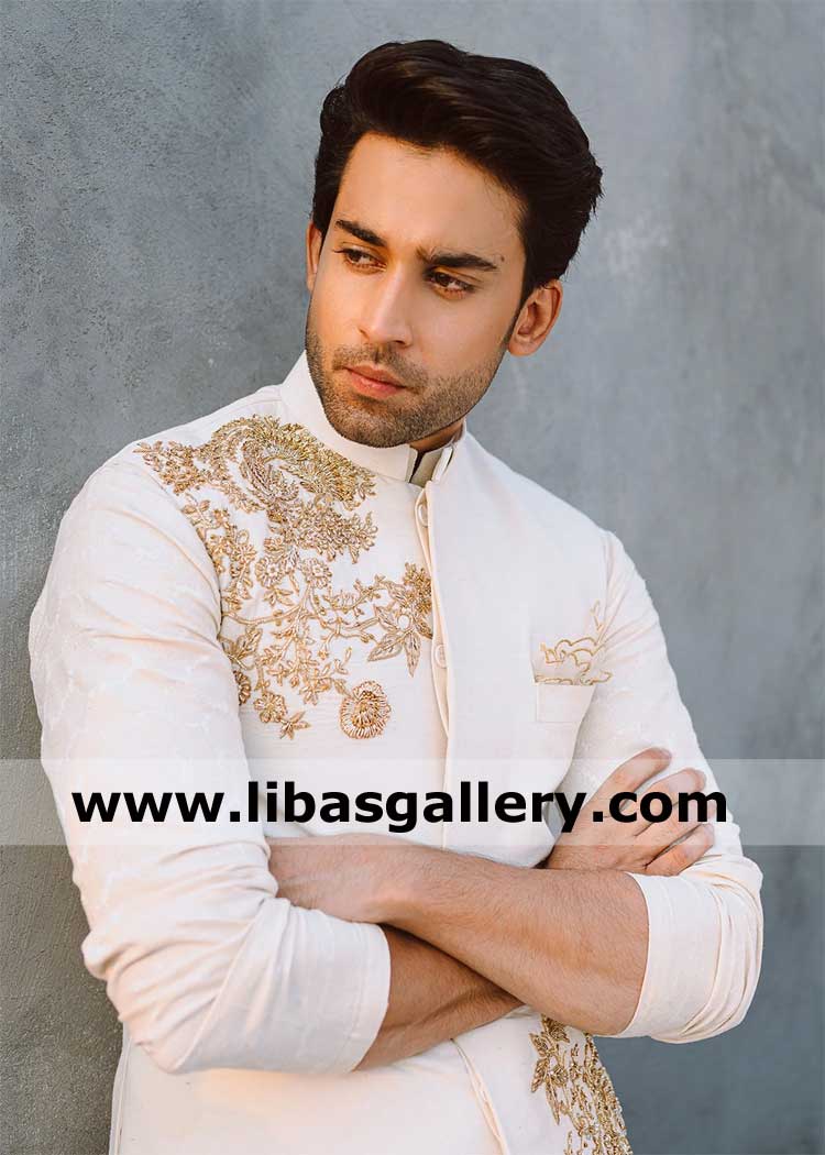 down to earth smart groom thinking of bride in embellished waistcoat