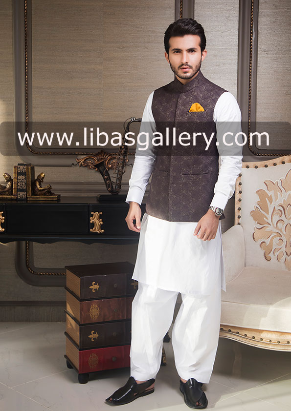 jamawar designer waist coat style for men paired with off white kurta shalwar shehroz sabzwari saudi arabia qatar usa jamawar designer waist coat style for men paired with off white kurta shalwar shehroz sabzwari saudi arabia qatar usa