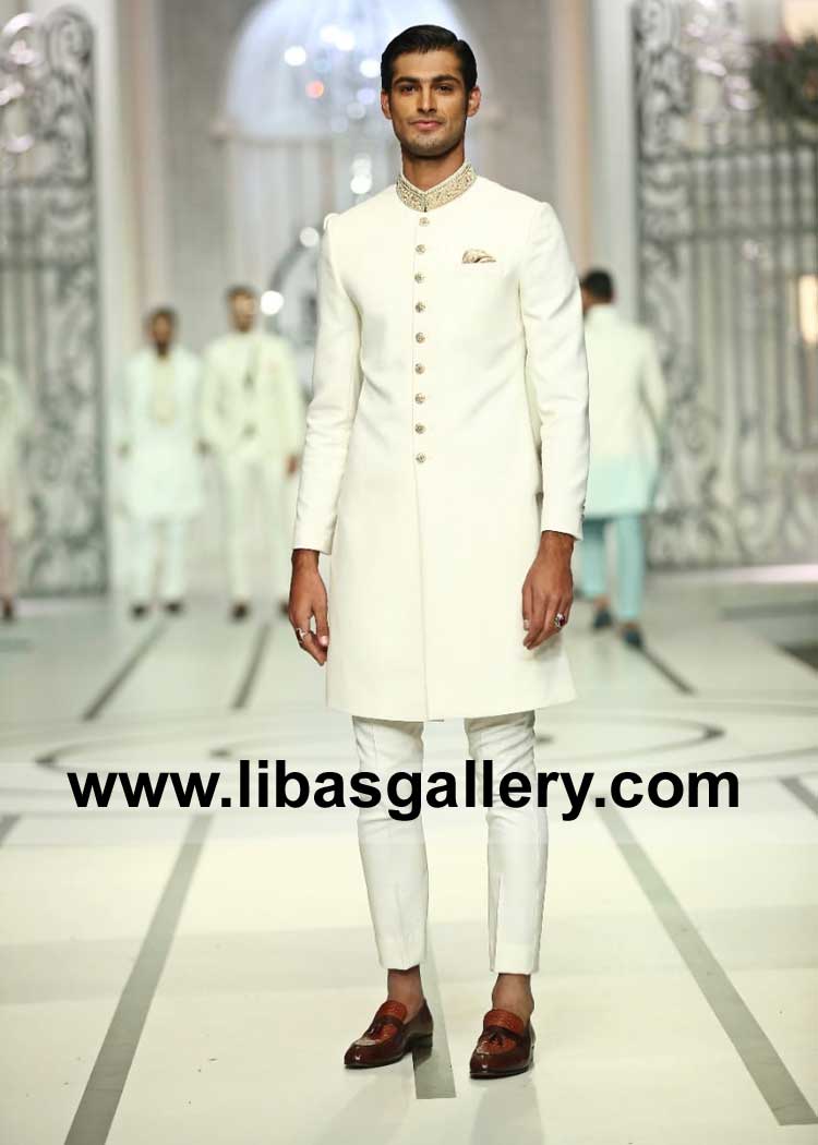 white sherwani made on Italian suiting fabric with kora dabka hand embellished collar paired with inner kurta pajama UK USA Canada Australia Dubai white sherwani made on Italian suiting fabric with kora dabka hand embellished collar paired with inner kurta pajama UK USA Canada Australia Dubai